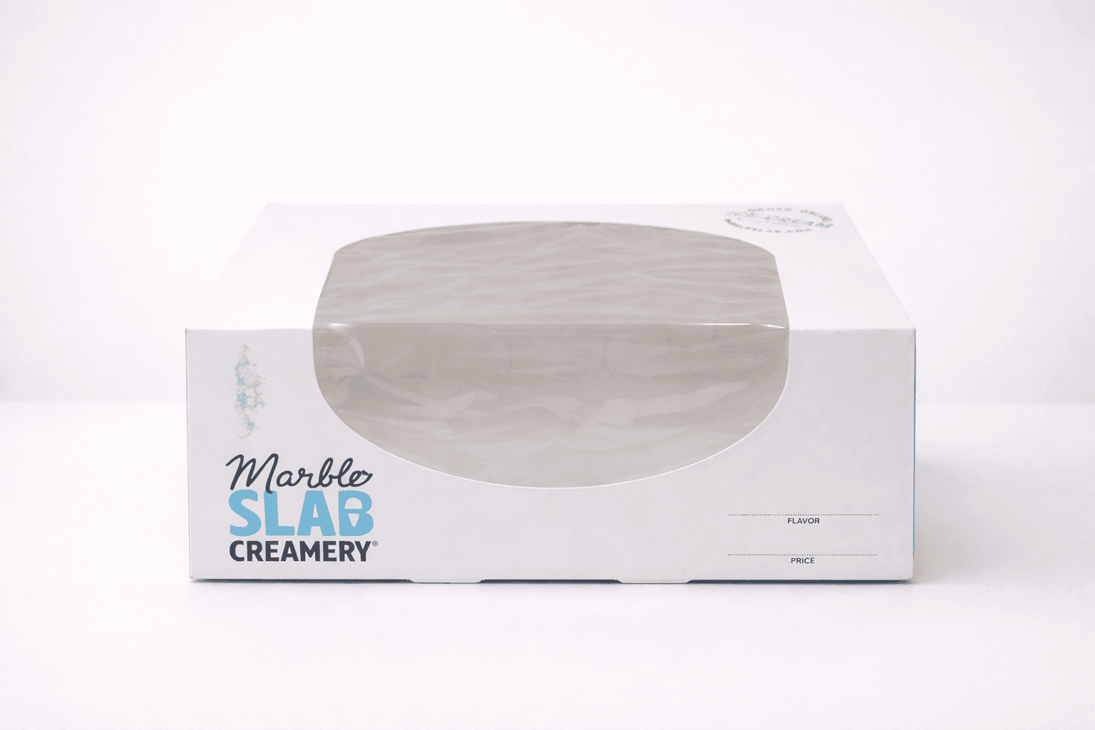 White windowed cake box with clear film window showing contents