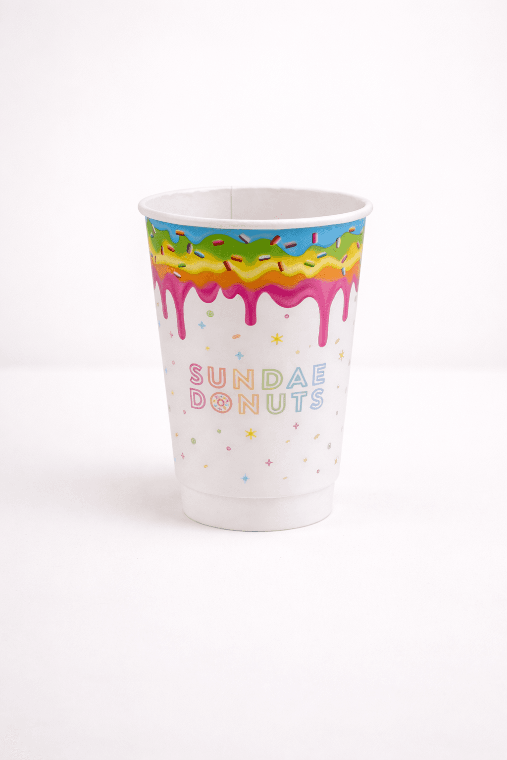 Colorful double-wall paper cup with dripping frosting design and brand logo