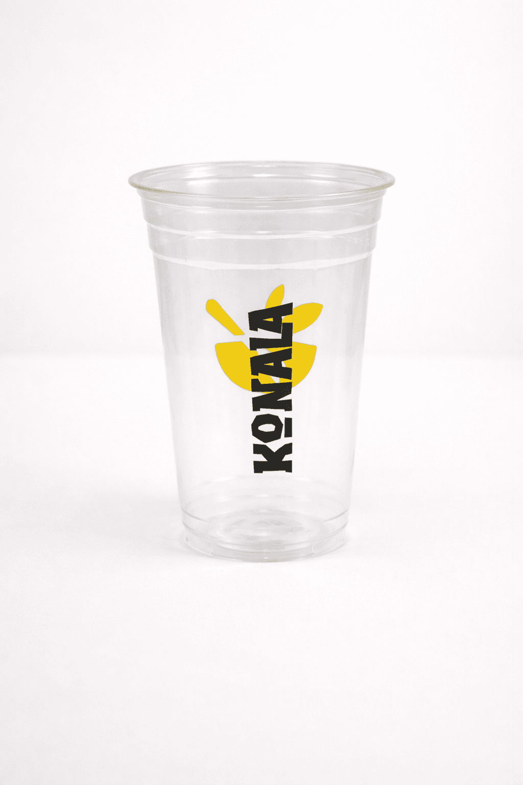 Clear branded plastic cup with yellow and black logo
